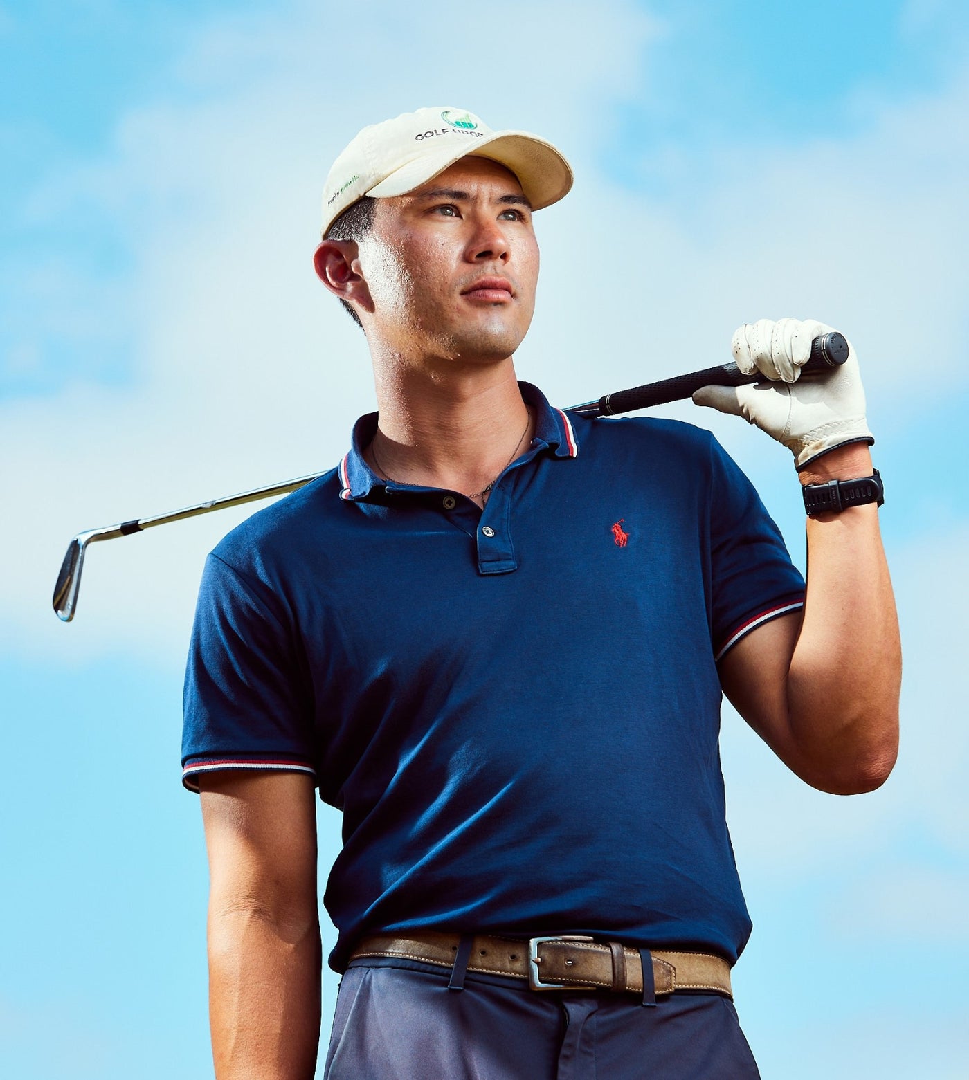 Jacob Williams, PGA Associate, holding a golf club in San Diego