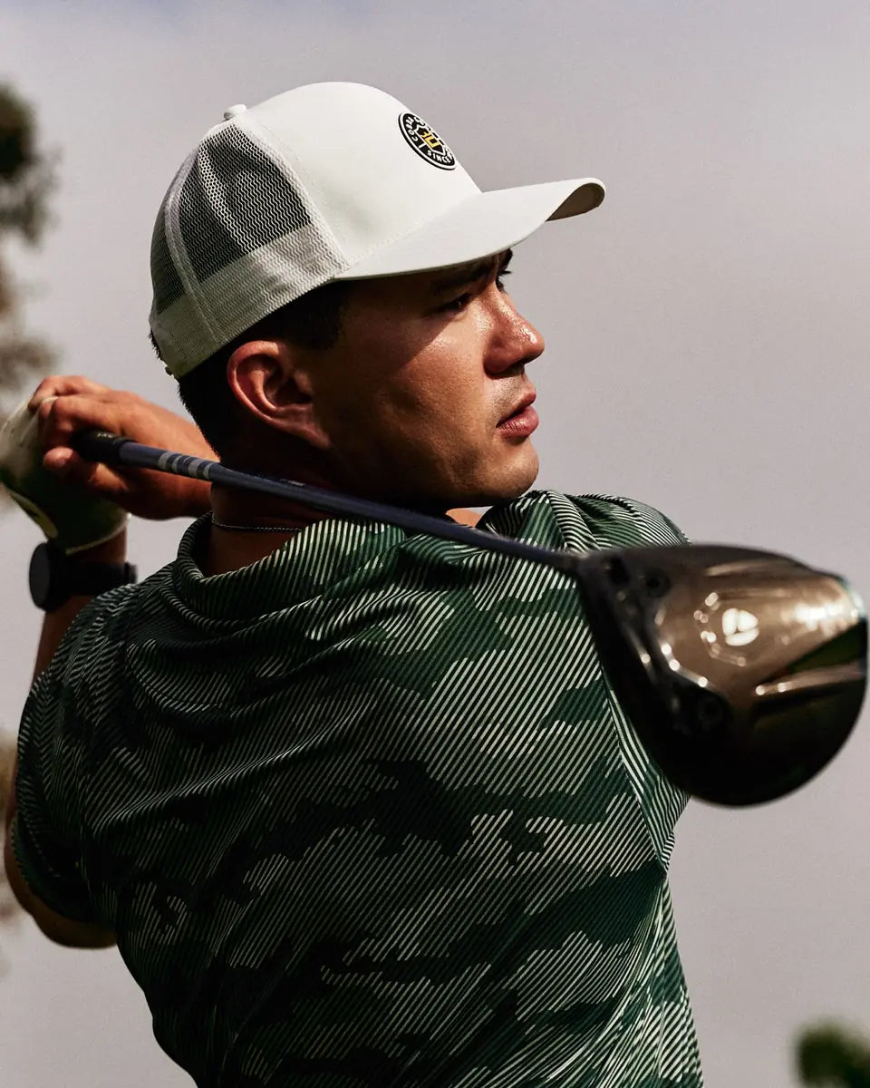 Jacob Williams finishing a driver swing