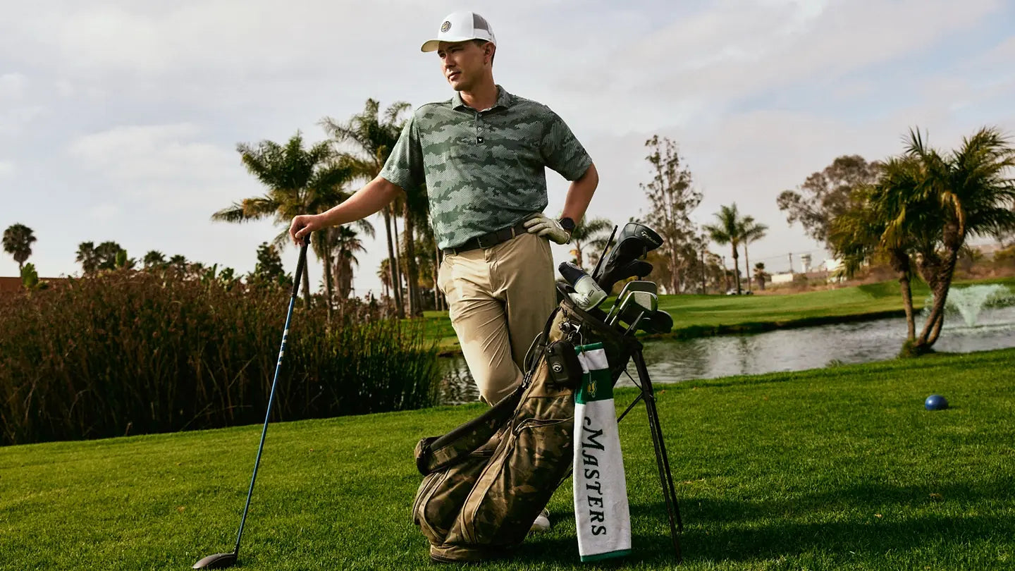 Jacob Williams standing beside his golf bag on a San Diego golf course